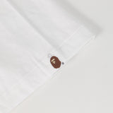 [M] A BATHING APE BAPE 00s LIMITED TO 100 AOYAMA-EXCLUSIVE APE FACE HAND-PRINTED T-SHIRT (DEADSTOCK, INCLUDES CAMPBELL'S SOUP CAN PACKAGING) WHITE